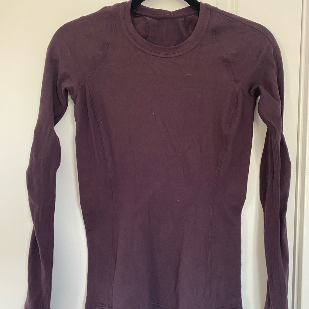 Lululemon long sleeve, skin-tight athletic top.
